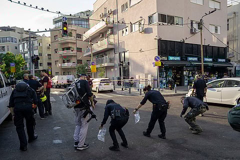 Israeli police investigate the scene in Tel Aviv